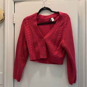 Cropped hot pink cardigan sweater